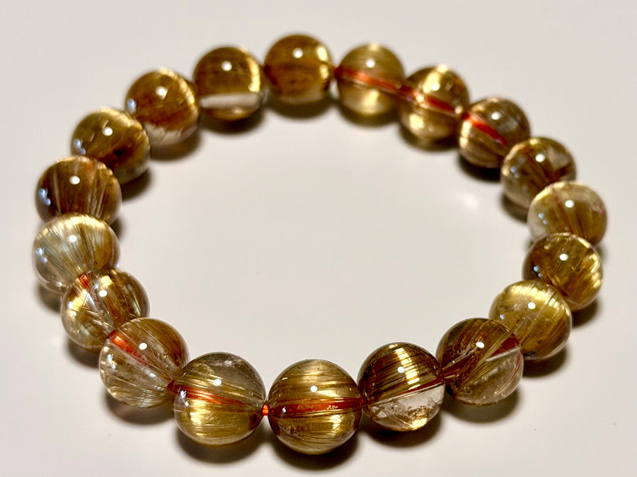 キャッツアイタイチンルチルクォーツ 10mm